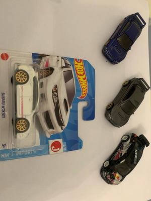 Hotwheels Subaru set of 4, two custom, like new without base
