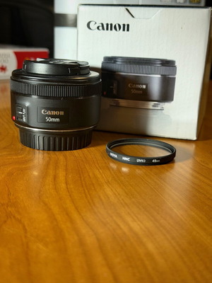 Canon EF 50mm F1.8 STM lens like new with box and papers