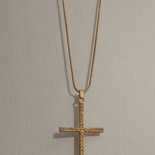 Gold-colored cross necklace with rhinestones
