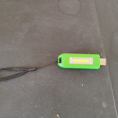 Flashlight that charges with USB new unused