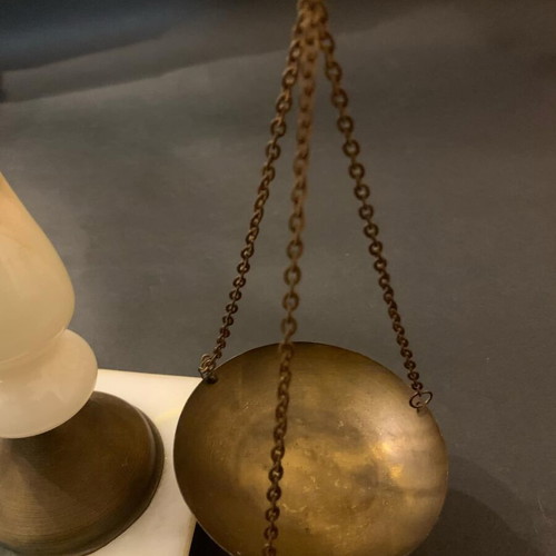 Decorative antique scale used with marble base and brass details