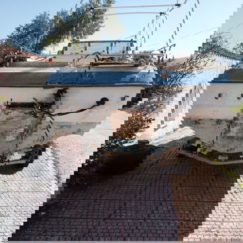 Σκάφος καμπινάτο πολυεστερικό 5.8 μεταχειρισμένο με τρέιλερ