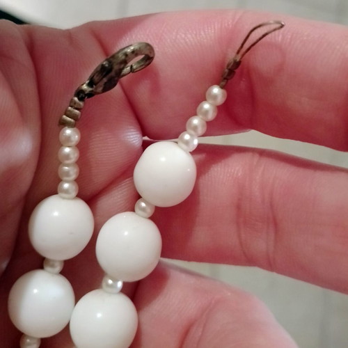Handmade necklace with white pearls and bone charm used