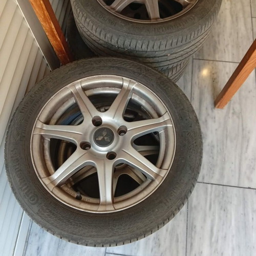 Set of 4 used 15-inch rims with Continental tires 2024, bolt pattern 114×14.3