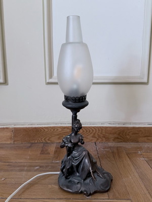Vintage table lamp with female figure used
