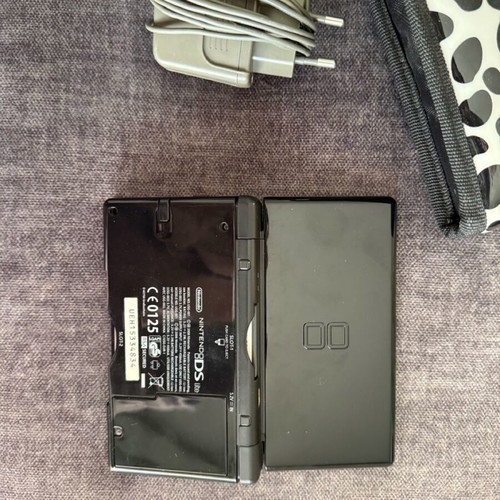 Nintendo DSLite used with 8 games and case