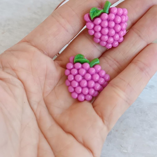 Plastic stud earrings like new, grape and clover design