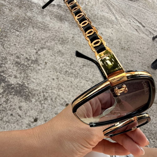 Chanel women's sunglasses black and gold, new model