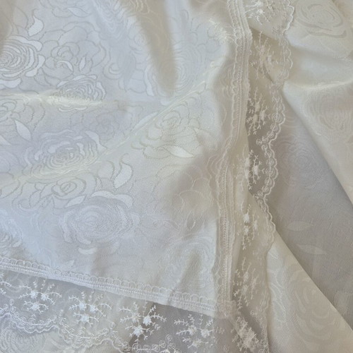White floral tablecloth with delicate lace edges like new