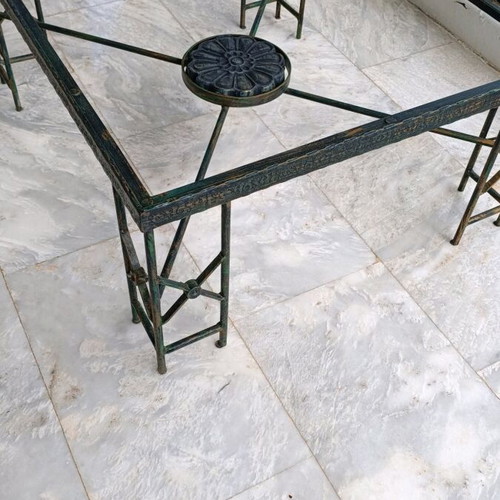 Metal table used with ceramic decoration and antique finish