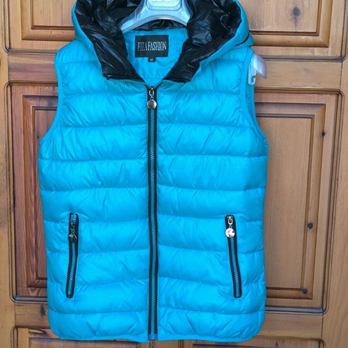 Turquoise vest used, size M