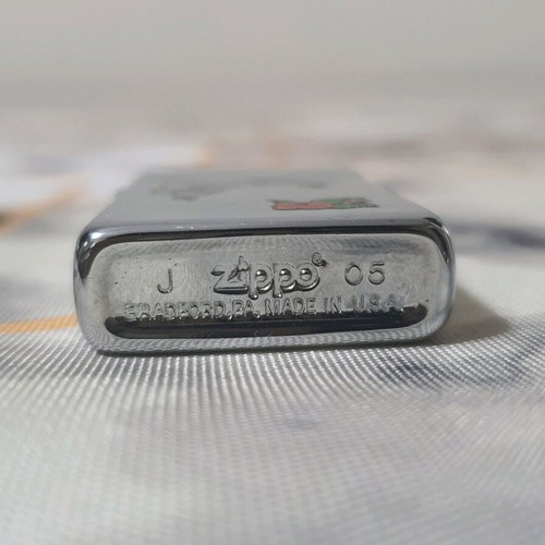 Zippo lighter used small size with engraved design