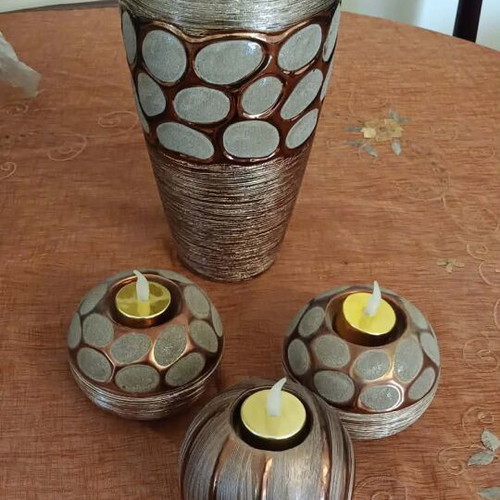 Brown vase and 3 brown tealight holders like new