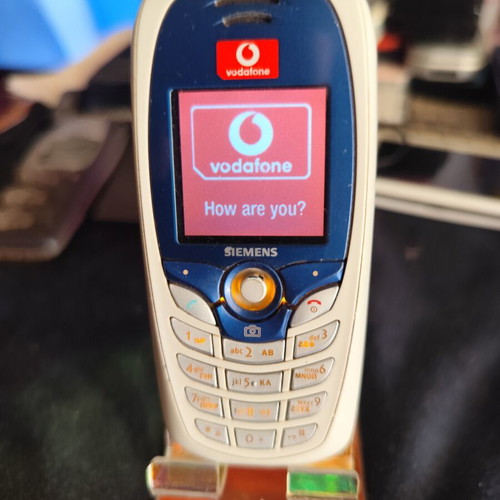 Siemens C65 mobile phone used, some keys not working, no charger