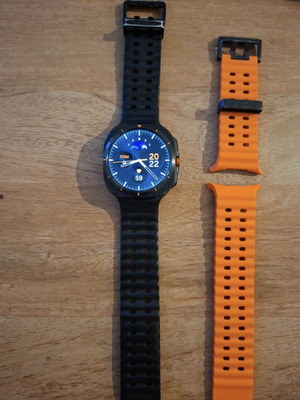 Samsung Galaxy Watch Ultra like new with two straps and charging cable