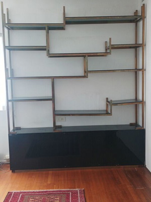 Bookcase used with asymmetric design, black lacquer and bronze detail
