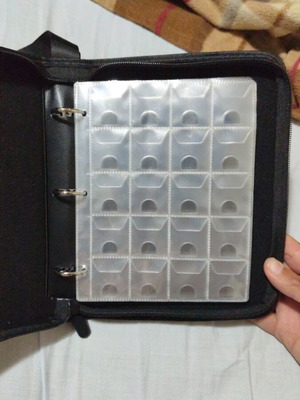 Premium coin binder new, holds 200 coins with expandable pages