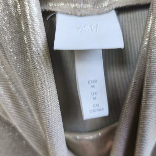 Gold turtleneck used H&M