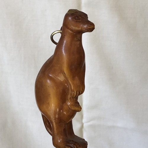Shoe brush and shoehorn set used with kangaroo sculpture