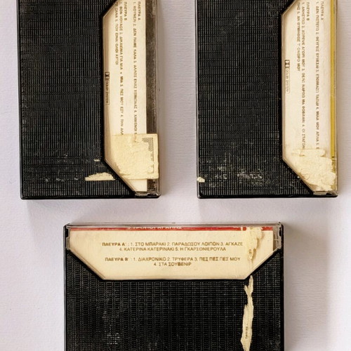 Three used Greek pop music cassettes from the 80s