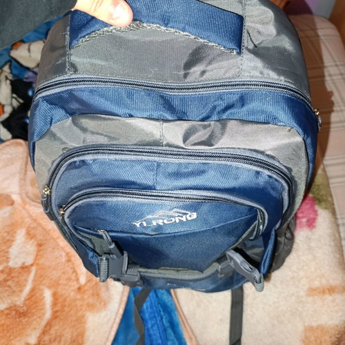YL RONG 55L backpack like new with 12 zippers and large storage spaces