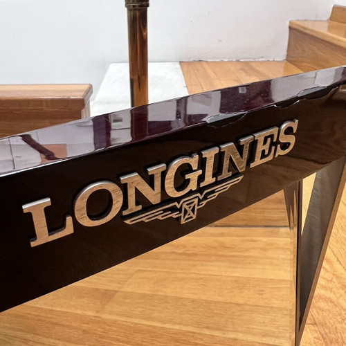 Longines mirror used with minor paint wear, wooden frame