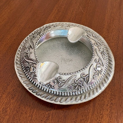 Vintage metal ashtray used with floral embossed details, 1970s