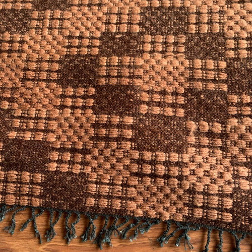 Machine-made wool rugs new with fringes and geometric patterns