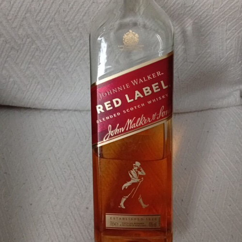 Johnnie Walker Red Label used half bottle