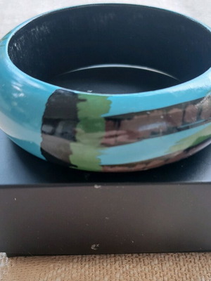 Boho wooden wide bracelet used with abstract designs
