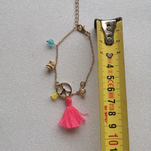 Bracelet like new with details and tassel