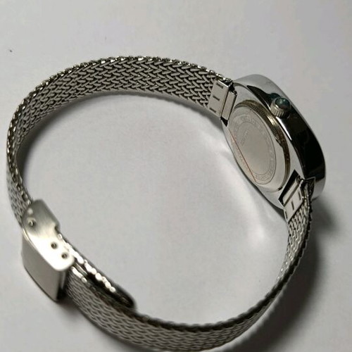 Silver women's watch like new with mesh bracelet and rhinestones