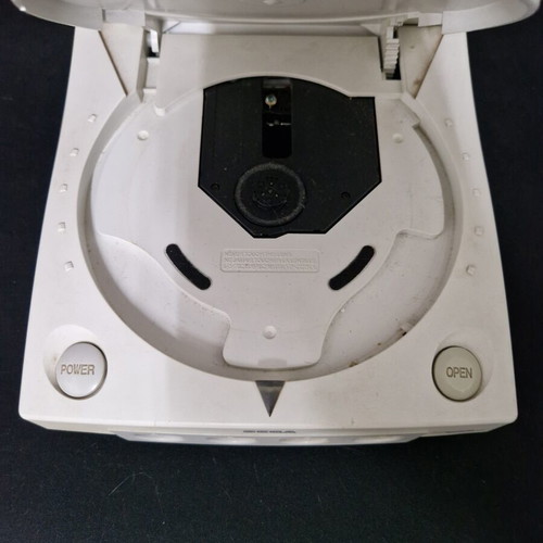Sega Dreamcast console used with 2 games, 2 controllers, memory cards, light gun, rumble pack