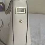 Axel shoulder bag like new, cream color
