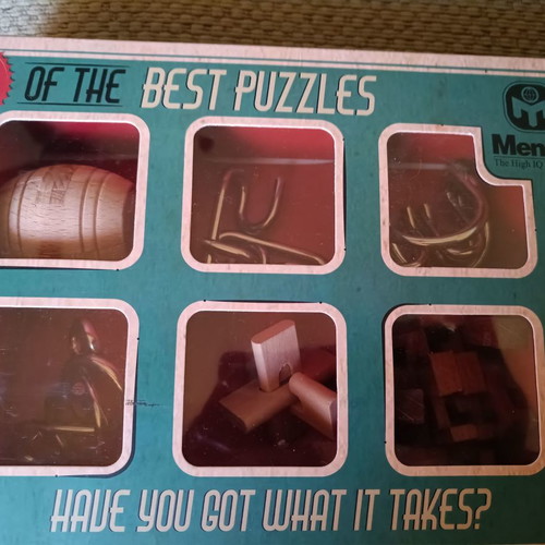 Puzzles and Riddles new, with box