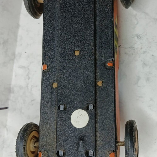 Collectible tin wind-up racing car from the 70s used