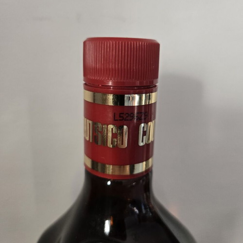 Coutsico vintage mango liqueur bottle, sealed