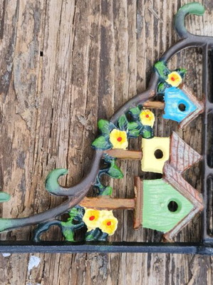 Massive cast iron corner with house motif new