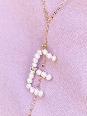 Monogram with pearls and gold stainless steel chain, new