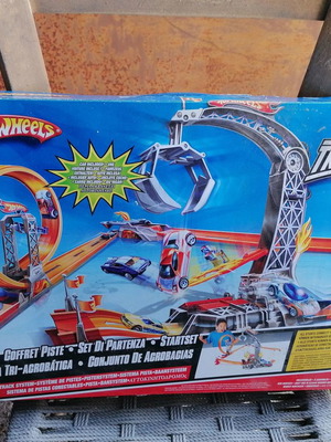 Hot Wheels tracks used without orange roads with large Batmobile and remote bulldozer