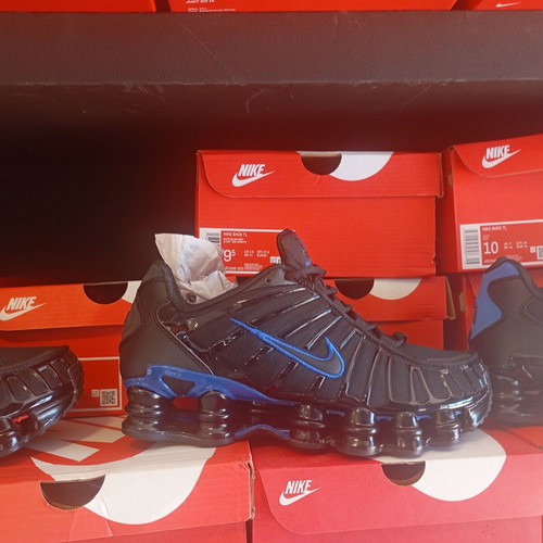 Nike Shox athletic shoes new, black and gold