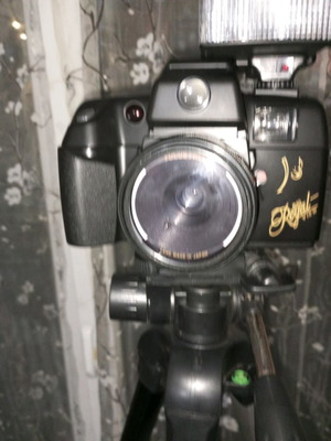 Camera with metal tripod, case, flash and carrying bag used