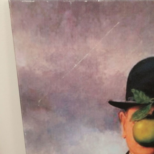 The Son of Man painting by Rene Magritte used, canvas print on wood frame