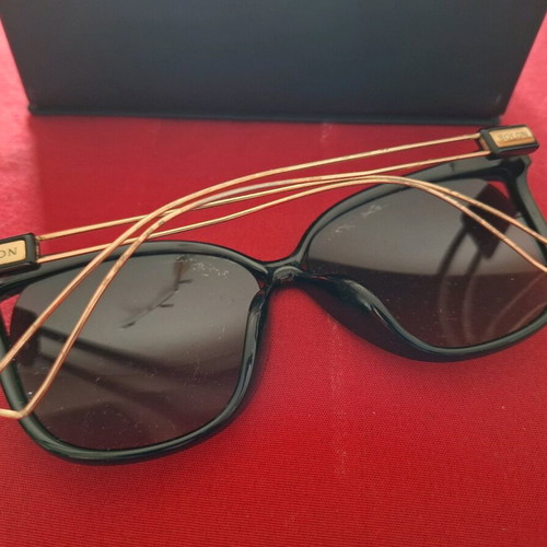 Black sunglasses with gold detail