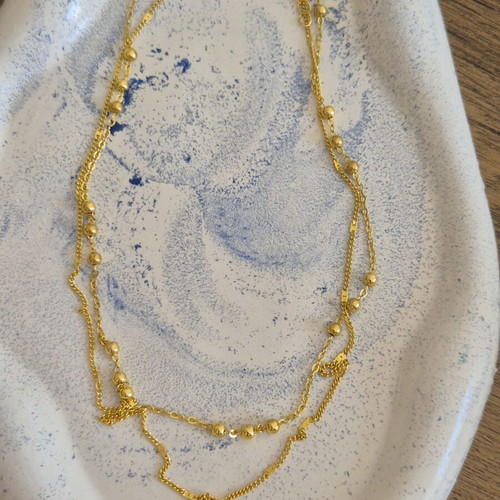 Gold double rosary-style necklace with cross, stainless steel