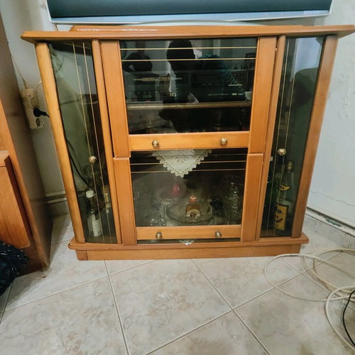 Vintage display cabinet like new with rotating TV stand