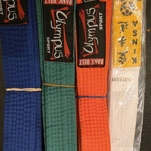 Karate equipment like new with 2 Hayashi and Force 1 suits, 4 belts, gloves, and shin guards