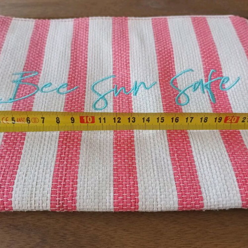 Summer toiletry bag used striped with embroidered Bee Sun Safe phrase