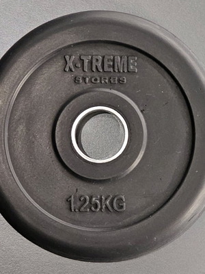 Pair of X-TREME STORES rubber weight plates used 2 x 1.25kg