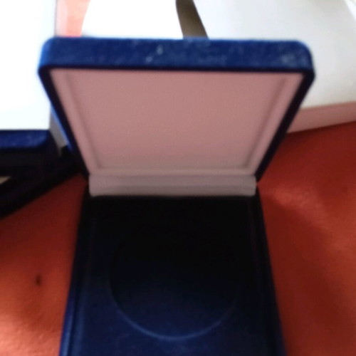 Coin holders like new, pack of 130 with 4 velvet-style boxes